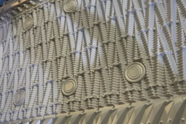 Structured Cooling Tower Film Fill for Enhanced Heat Transfer